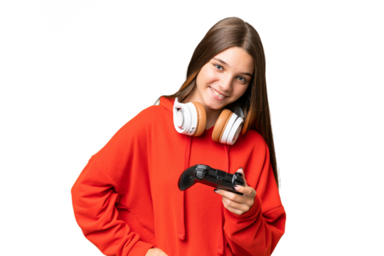 Teenager caucasian girl playing with a video game controller over isolated background posing with arms at hip and smiling