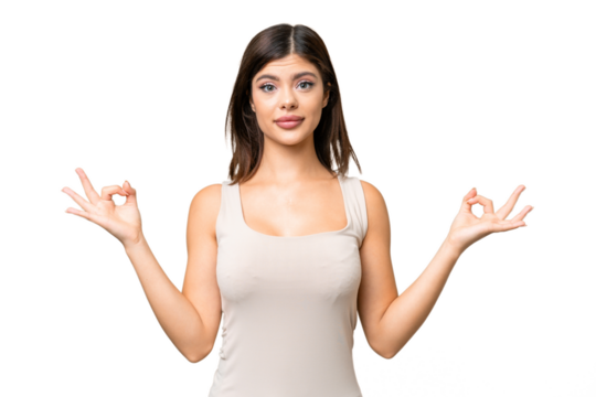 Young Russian woman over isolated chroma key background in zen pose