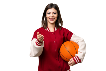 Young Russian woman playing basketball over isolated chroma key background shaking hands for closing a good deal