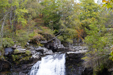 Falls of Falloch waterfall in Loch Lomond And Trossachs National Park, in Autumn in Stirling County on the West Highland, Scotland