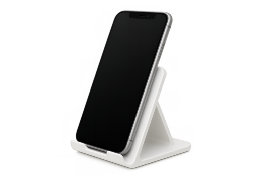 Smartphone with blank screen standing on a white display holder against a transparent background