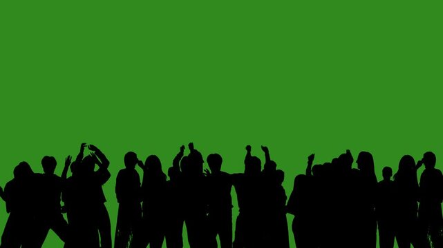 Black isolated silhouettes of people dancing cheerfully on a green chroma key background. Minimalist contrast and modern visual composition, mockup.