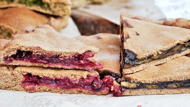 Indian pie slices with sweet fruit filling, berry and banana flavors