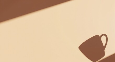 Coffee Cup Shadow on beige background: The minimalistic image of a coffee cup shadow dancing on a clean beige surface, this composition showcases a play of light.