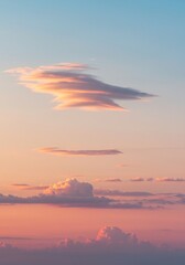 Fototapeta premium A serene sky displays delicate, smooth cloud formations with a soft color transition, evoking a tranquil, dreamlike atmosphere ,silky ,pastel ,dusk