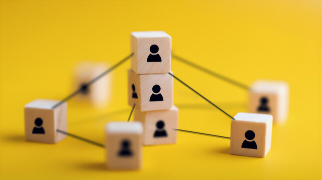 組織構造と人的ネットワークのコンセプトを示す木製ブロック