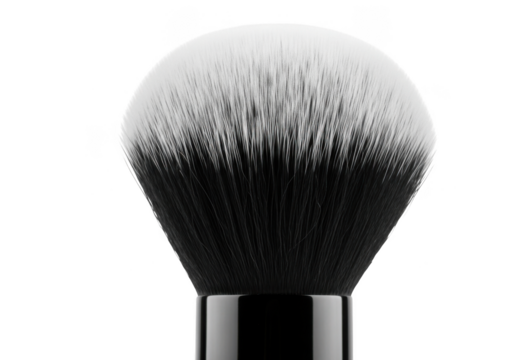 Closeup of a fluffy makeup brush with black handle and white and black bristles, isolated on transparent background