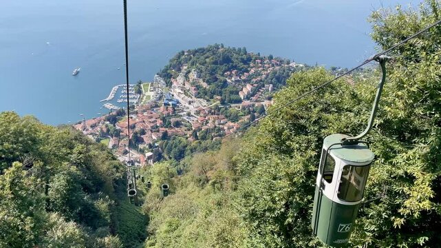 Panoramic view of Laveno-Mombello and Lake Maggiore, seen from Funivia Monte Sasso del Ferro, Lombardy, Italy.