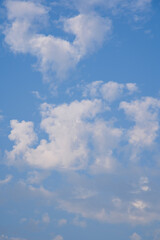 Blue Sky with White Fluffy Clouds