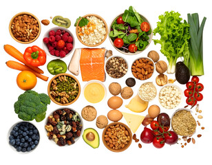 A colorful assortment of fresh fruits, vegetables, nuts, and dairy products arranged in bowls and on a surface for healthy eating