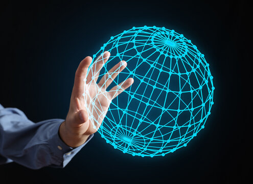 Hand creating global network connection technology sphere