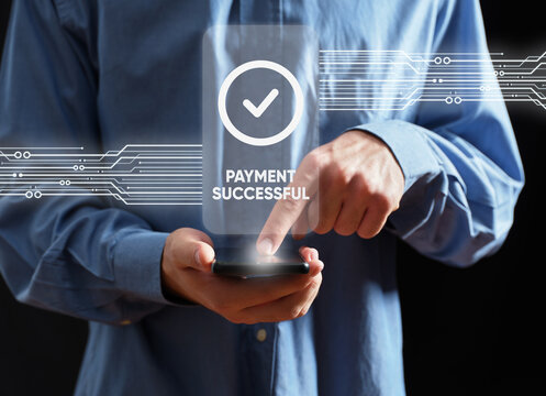 Person checking mobile phone payment successful confirmation