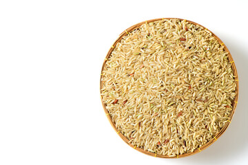 top view of traditional woven basket filled with uncooked brown rice grains isolated.bread and bakery concept
