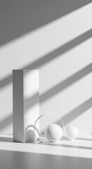 Bright, clean studio composition showing abstract geometric shapes casting long, soft shadows against a pure white surface ,shape ,background ,simple