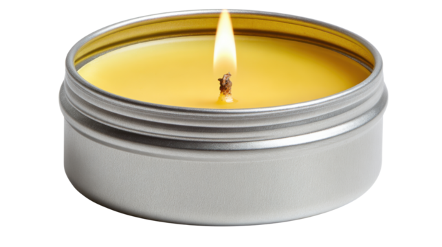 Small metal tin candle with burning flame and smooth yellow wax surface creating warm cozy relaxing calming aromatherapy atmosphere on white background