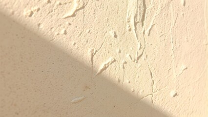 Textured Beige Wall Surface with Shadow Abstract Minimalist Background with Rough Surface