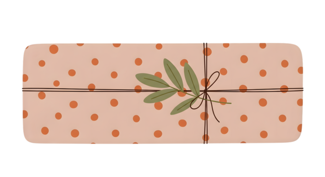 A single, long, rectangular gift box wrapped in light pink paper with orange polka dots and a green leaf sprig isolated on transparent background
