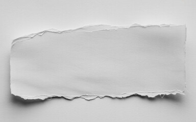 Obraz premium Torn edge of white paper on a white background creating a minimalist and textured backdrop for graphic design projects and artistic presentations with subtle shadows