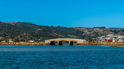 A view from the knysna river towards the causeway leading to Thesen Island, South Africa in Springtime