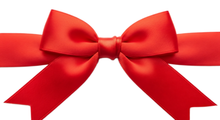 Close up of a bright red satin ribbon tied in a bow against a black background in a horizontal shot