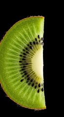 Close up view of a vibrant green kiwifruit slice displaying tiny black seeds. Refreshing tropical fruit, rich in vitamins and flavor ,juicy ,organic ,ripe