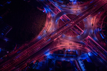 Expressway, Self-driving autonomous electric cars of the future with elements move along a busy traffic intersection. Artificial Intelligence, Car Scan, GPS Tracking, Smart Roads, IoT, highway