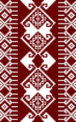 A vibrant textile pattern featuring geometric shapes in red and white, showcasing traditional design elements.