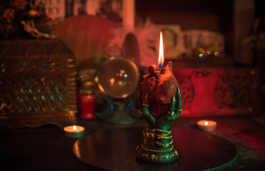 Burning heart in hands, mystical ritual and love magic concept. Perfect for illustrating love...