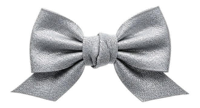 Close up of a shiny silver bow tie with a textured surface against a black background space