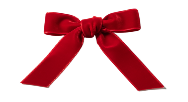 A single red velvet bow with a knot in the center against a black background in a studio shot