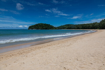 Beautiful marine nature of Thailand. Waves on the ocean. Green tropical island. Blue clear sky.	
