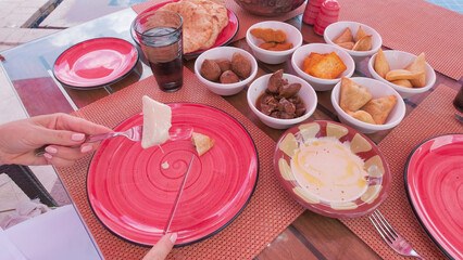 Traditional Egyptian meal with a variety of colorful dishes served during a vacation, showcasing local flavors and culture.