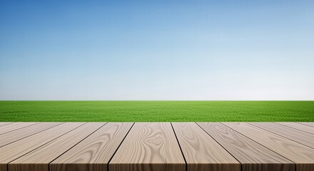 Wooden Deck with Green Field and Blue Sky Background.