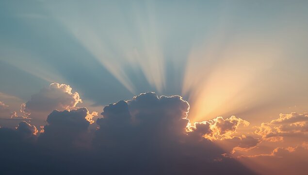 Dramatic sunset sky with sun rays bursting through clouds creating a stunning atmospheric landscape, perfect for backgrounds