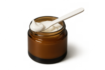 Skincare cream in brown jar with spatula, highlighting organic beauty product and healthy skin routine for wellness