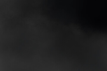 Dusty Smoke Overlay on a Deep Black Background