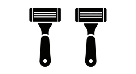 two black spatulas side by side with white background