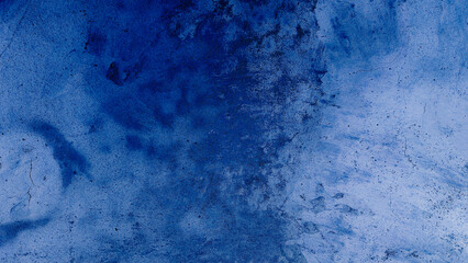 Dark blue grungy backdrop with golden splatters. Abstract dark blue concrete texture background.