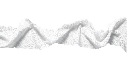 Close up of delicate white lace trim with a ruffled edge against a stark black background
