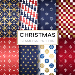 Fototapeta premium Christmas seamless pattern set with red, navy, and gold colors featuring stars, snowflakes, and trees for classic festive vector backgrounds