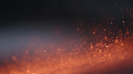 Fire sparks and glowing embers flying in dark space, abstract warm light frame from above and below