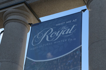 Fototapeta premium hanging banner advertising The Royal or The Royal Agricultural Winter Fair at Princes' Gates, Exhibition Place, Toronto