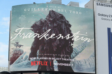 Fototapeta premium digital sign displaying Guillermo del Toro film Frankenstein at Sankofa Square, Toronto