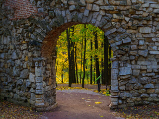 arch of an ancient tower with brick walls