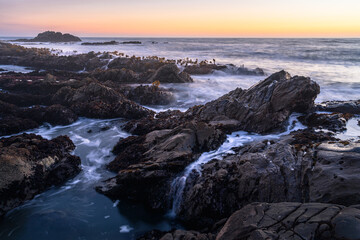Fototapeta premium Long Exposure Seascape at Golden Hour – Rocky Coast