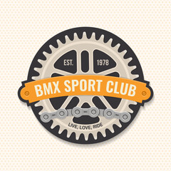 Fototapeta premium Bmx extreme sport club badge, patch, sticker. Vector. Concept for shirt, logo, print, stamp, tee with sprocket, chain. Vintage typography design with bmx sprocket and chain silhouette.