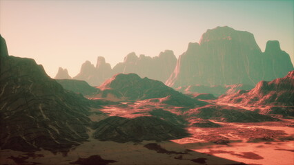 A stunning desert expanse features rugged mountains and smooth valleys bathed in warm, golden light. The unique rock formations create an otherworldly scene at dusk. © icetray