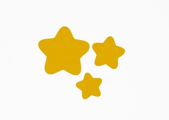 Set of Three Bright Yellow Star Shapes of Varying Sizes Isolated on Pure White Background for 3-Star Rating Quality or Achievement Concept