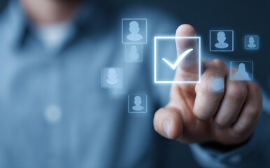Focused man using finger touching screen for choosing candidate in human resource recruitment. selection process shows positive technology interface concept