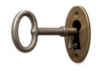 Skeleton key turning in a vintage brass keyhole. Symbolizing discovery, security, access, opportunity, and success